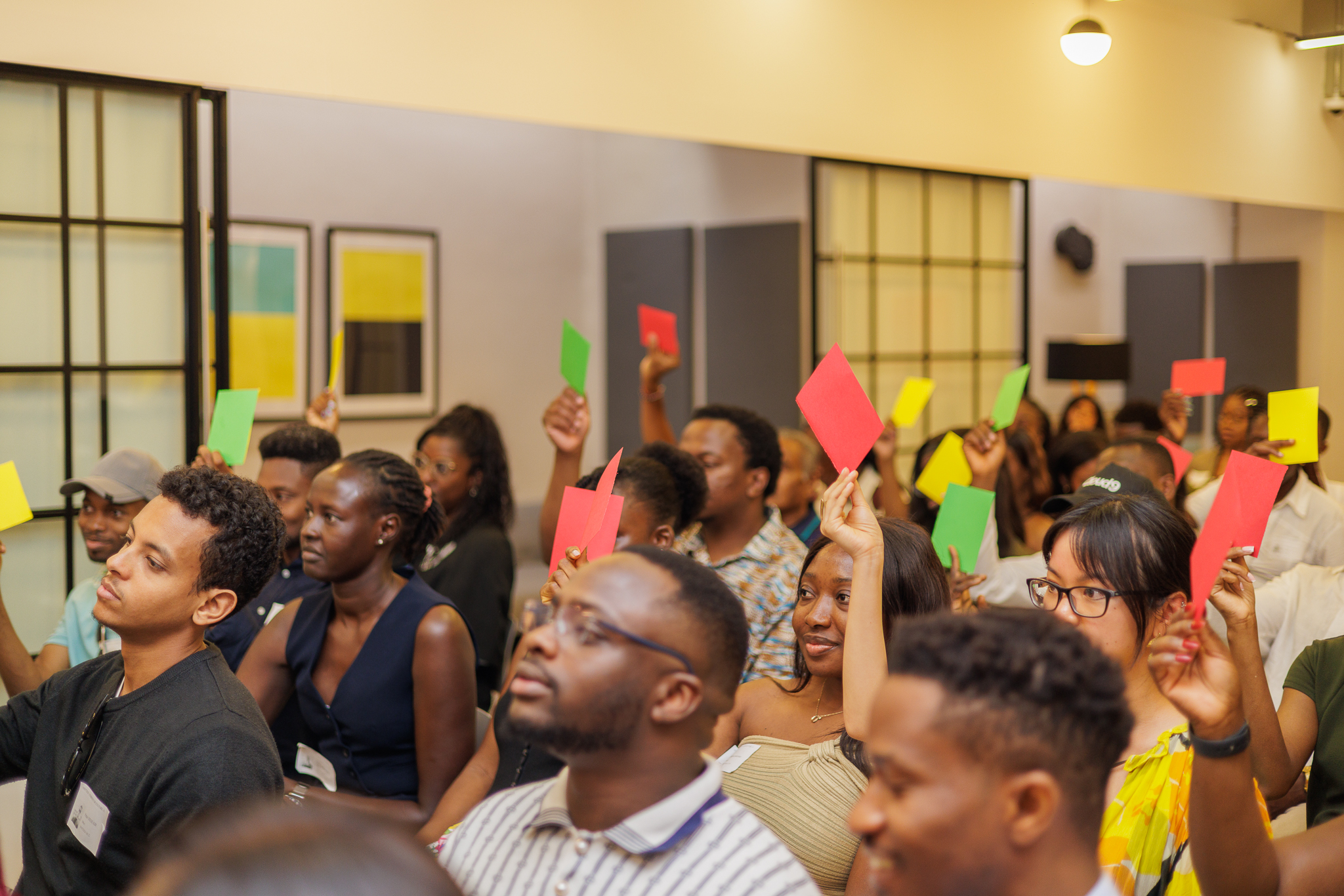 The audience voting with red, yellow and green cards